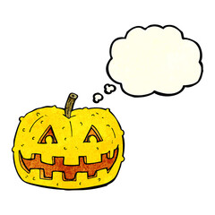 cartoon pumpkin with thought bubble