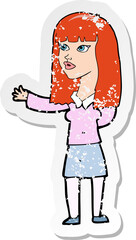 retro distressed sticker of a cartoon woman gesturing to show something