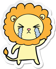 sticker of a cartoon crying lion