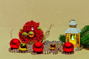 Christmas Cards Glass Teapot teapot with Christmas toys, cones and accessories.A candle is...