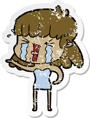 distressed sticker of a cartoon woman in tears