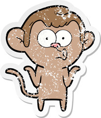 distressed sticker of a cartoon confused monkey