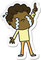sticker of a cartoon man crying