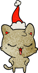happy textured cartoon of a cat wearing santa hat