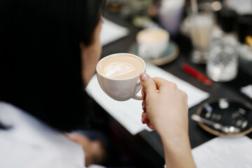 Barista makes the perfect cappuccino