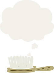 cartoon hairbrush and thought bubble in retro style
