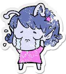 distressed sticker of a cartoon crying alien girl