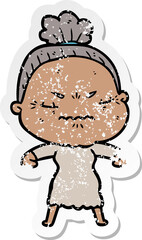 distressed sticker of a cartoon annoyed old lady