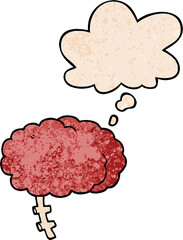cartoon brain and thought bubble in grunge texture pattern style
