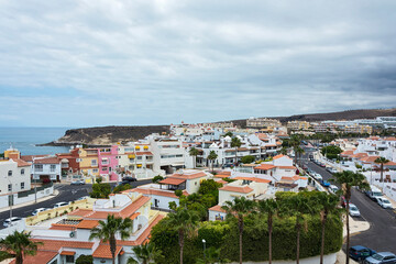 Fototapeta na wymiar Urban landscape. Fishing village of La Caleta on the ocean from a height ( Tenerife, Spain)