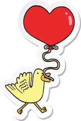sticker of a cartoon bird with heart balloon