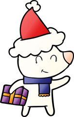 female polar bear with christmas present wearing santa hat