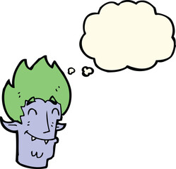 cartoon happy vampire head with thought bubble