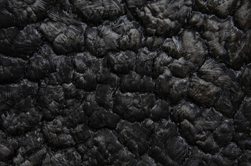 Burned wood with abstract patterns suitable for backgrounds
