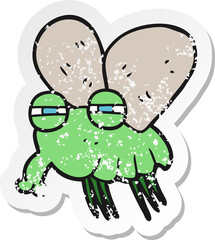 retro distressed sticker of a cartoon fly