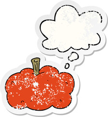 cartoon pumpkin and thought bubble as a distressed worn sticker