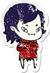 distressed sticker of a cartoon friendly vampire girl