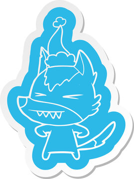 angry wolf cartoon  sticker of a wearing santa hat