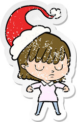 distressed sticker cartoon of a woman wearing santa hat