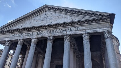 Rome, Italy. Front exterior of Pantheon ancient roman building with pillars columns. Rotunda square (Piazza della Rotonda) 