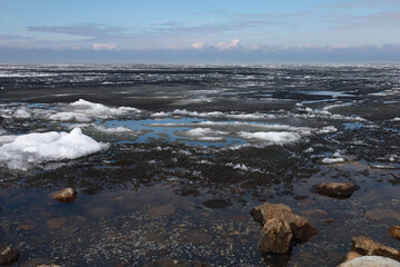 Ice drift on the river. Melting ice on the river has a crystalline structure. 
Melting ice in the river creates a beautiful abstract picture.
