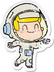 distressed sticker of a happy cartoon astronaut man