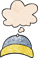 cartoon hat and thought bubble in grunge texture pattern style