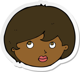 sticker of a cartoon female face looking upwards