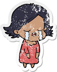 distressed sticker of a cartoon girl crying