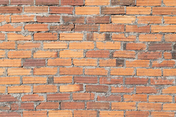 Aged brick wall background texture. Full frame