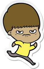 sticker of a cartoon angry boy