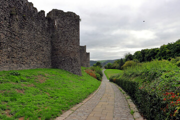Fototapeta na wymiar The Conway Castle on a cobblestone pathway in Wales