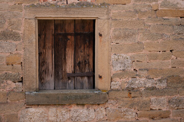 Fototapeta na wymiar Old masonry with wooden door, detail, Rothenburg ob der Tauber, Bavaria, Germany, Europe