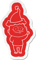 cartoon  sticker of a bald man staring wearing santa hat