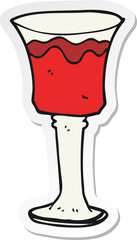 sticker of a cartoon goblet of wine