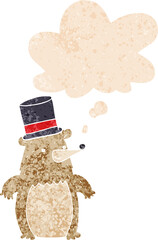 cartoon bear in top hat and thought bubble in retro textured style