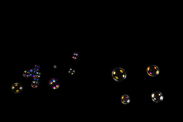 Soap bubbles isolated on a black background