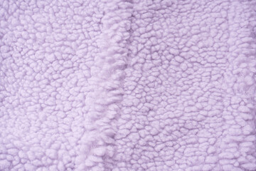 Purple fur texture as a background.