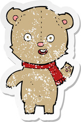 retro distressed sticker of a cartoon waving teddy bear with scarf