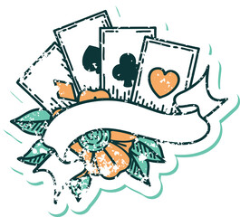 distressed sticker tattoo style icon of cards and banner