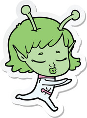 sticker of a cartoon alien girl