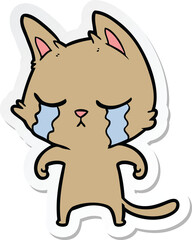 sticker of a crying cartoon cat