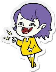 sticker of a cartoon laughing vampire girl