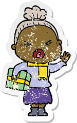 distressed sticker of a cartoon angry old woman