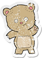retro distressed sticker of a cartoon teddy bear