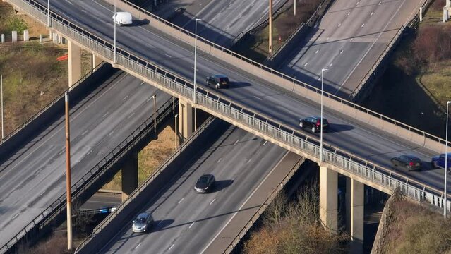 Vehicles Driving Along a Motorway Interchange in the UK