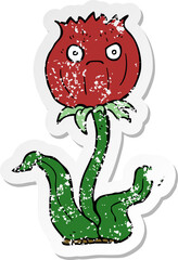 distressed sticker of a cartoon thistle