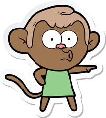 sticker of a cartoon pointing monkey