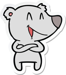 sticker of a laughing bear cartoon