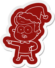 cartoon  sticker of a staring man wearing santa hat